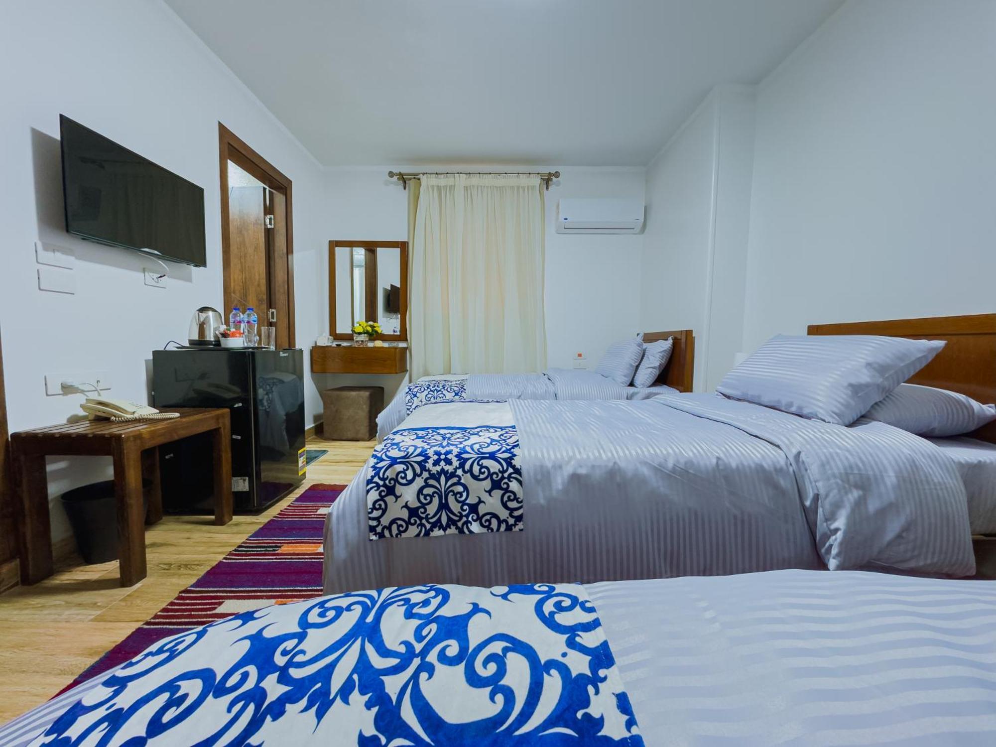 Royal Crown Hotel Giza Pyramids View Kafret el-Gabal Rum bild