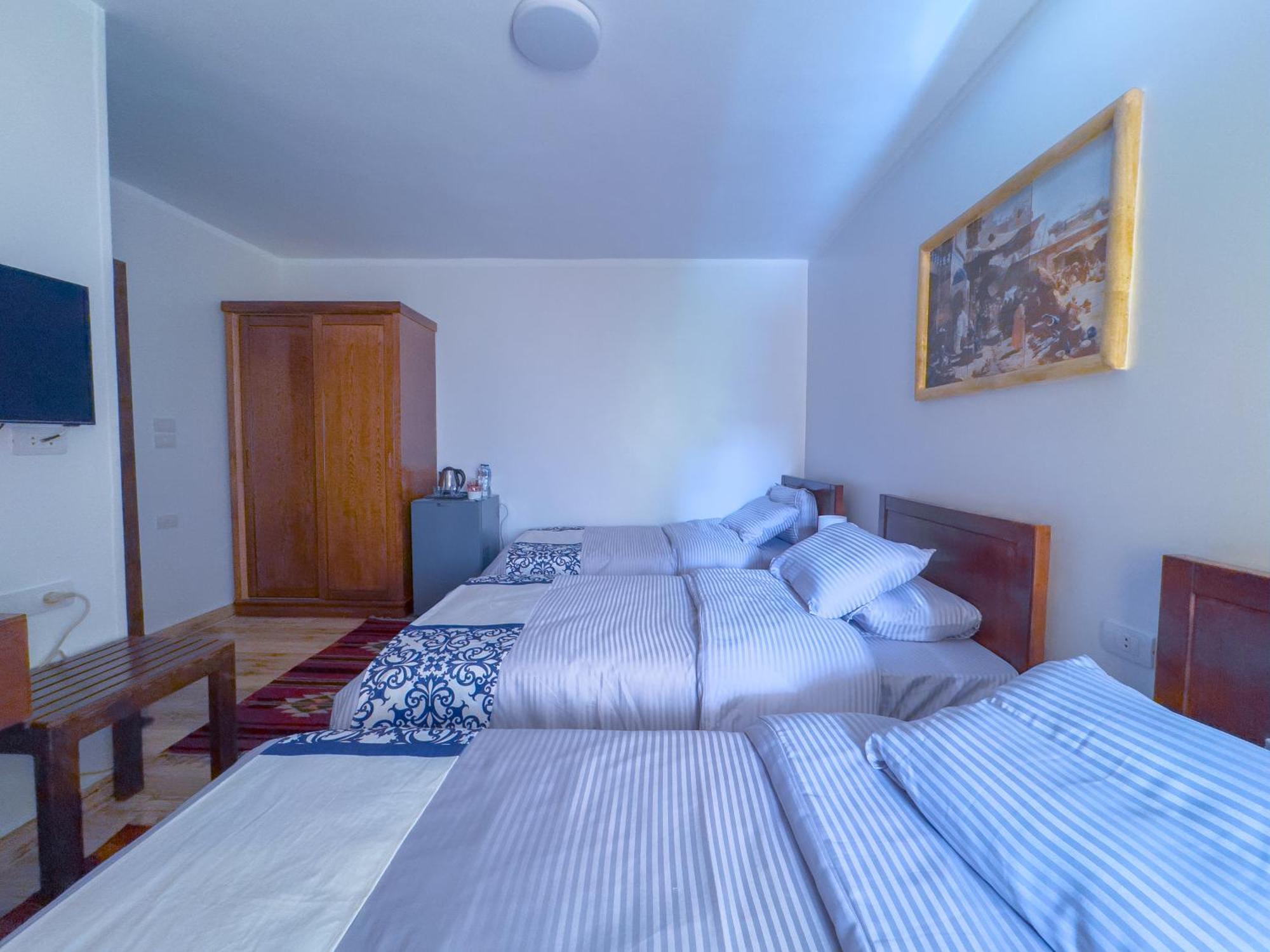 Royal Crown Hotel Giza Pyramids View Kafret el-Gabal Rum bild